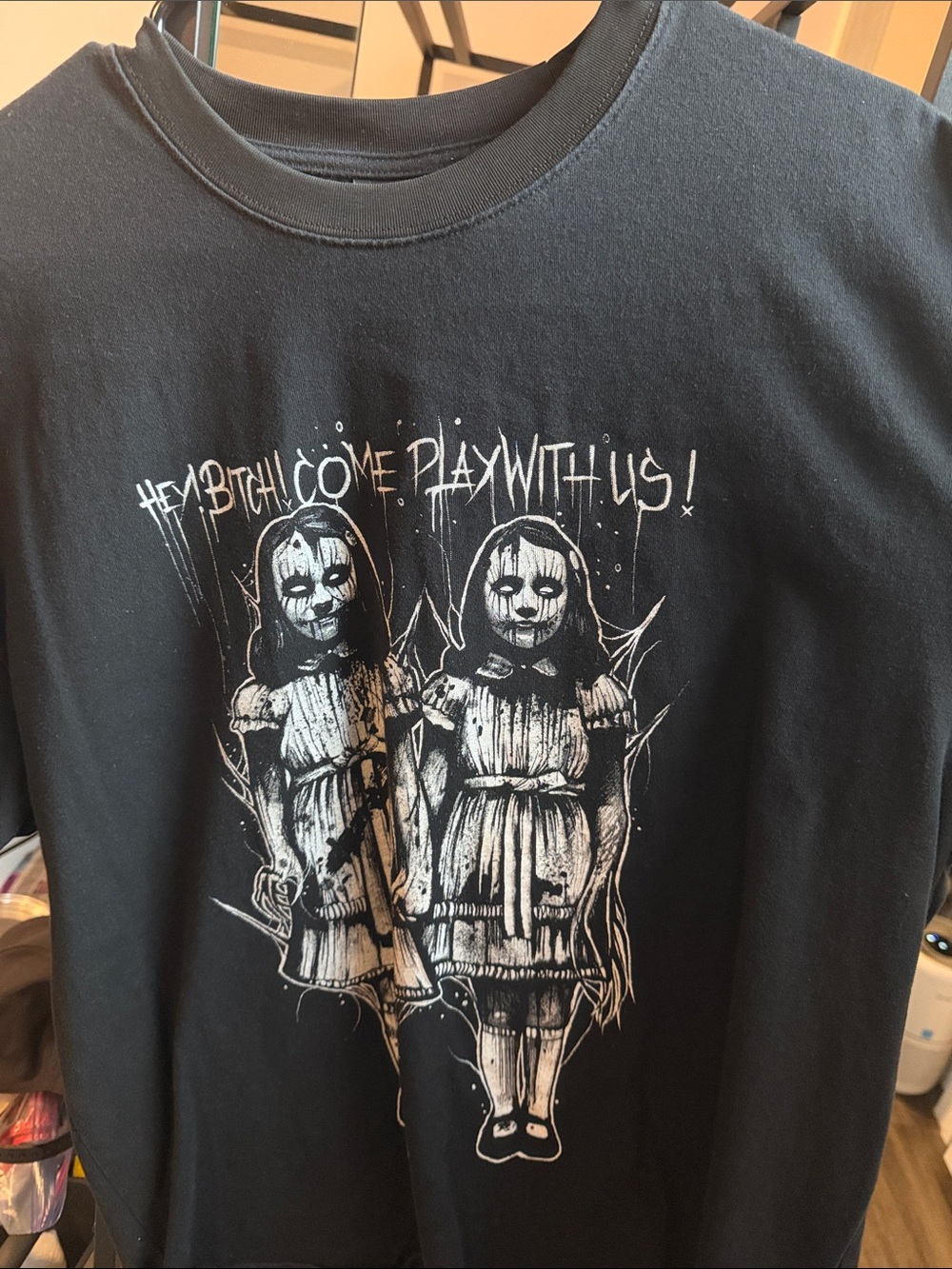 Black Graphic Horror Tee with Twin Doll Print